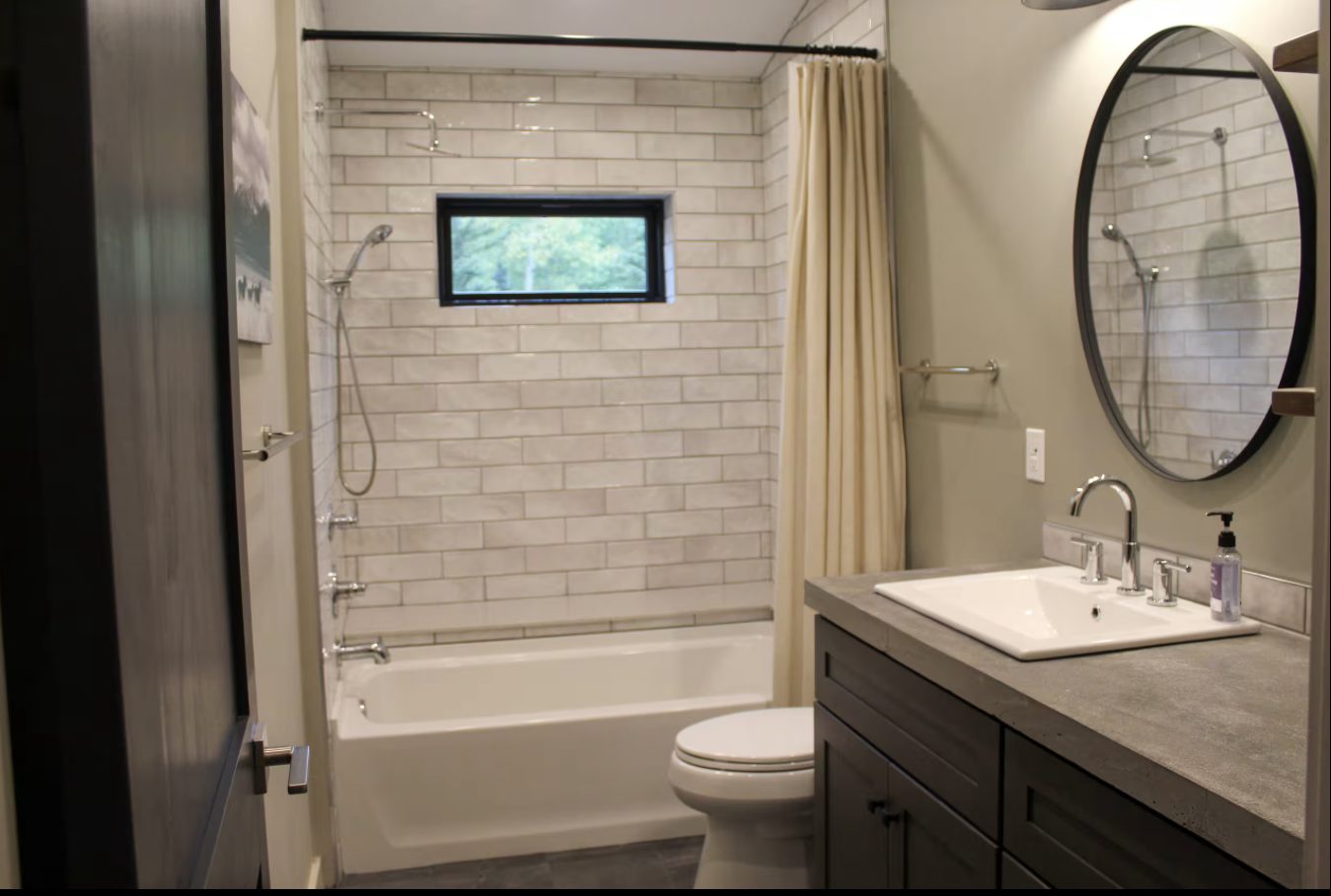 Guest bathroom with tub and shower